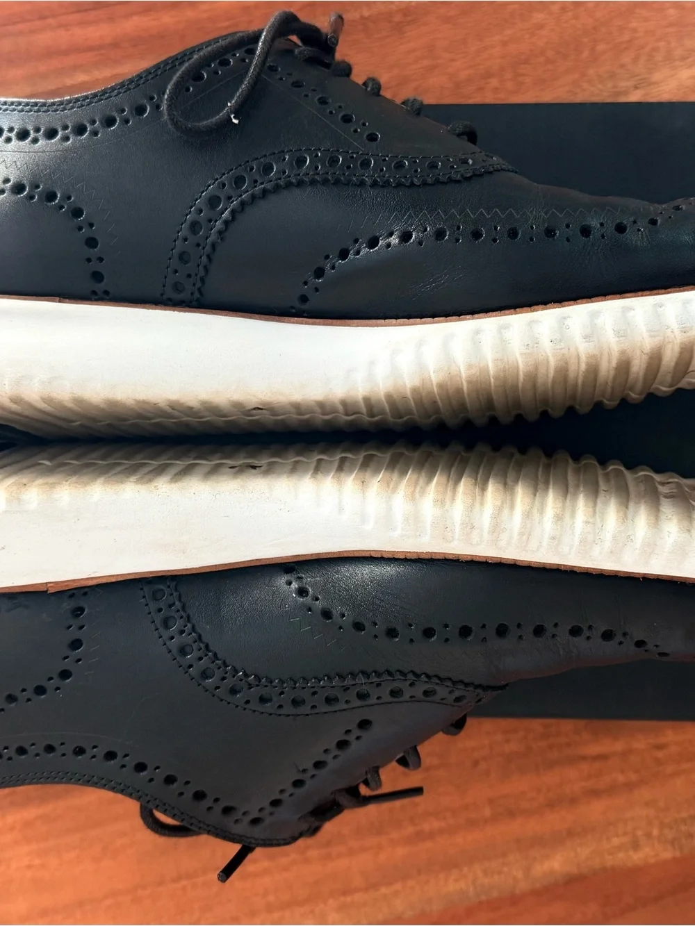 Cole Haan Black Leather Wingtip Oxfords with White Sole